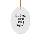 Leather Tooling Gifts for Friends, Coworkers, Family - Eat. Sleep. Leather Tooling. Repeat. Oval Ornament for Christmas, Gifts from Men, Women, Friends, Coworkers, Family - Image 1